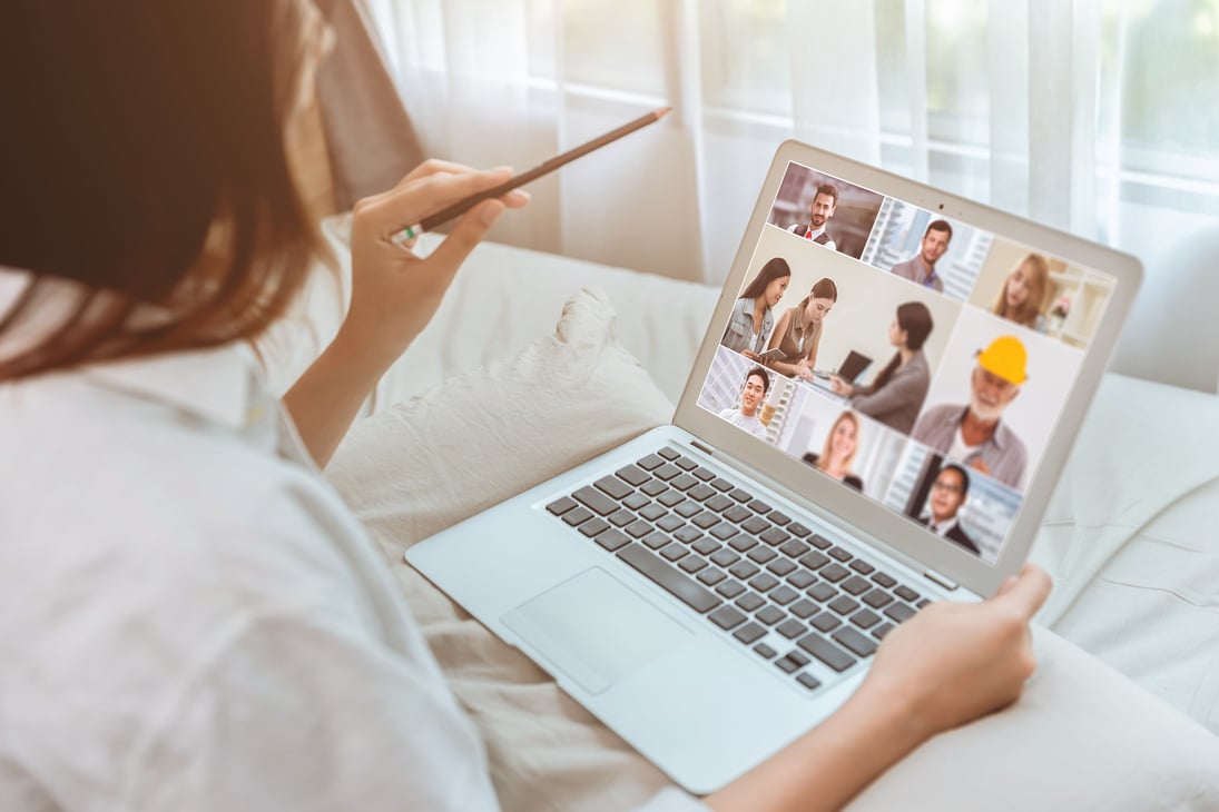 Business Women Stay Home Closeup Zoom Meeting Video Call with Business Partner with Laptop during Self Quarantine.