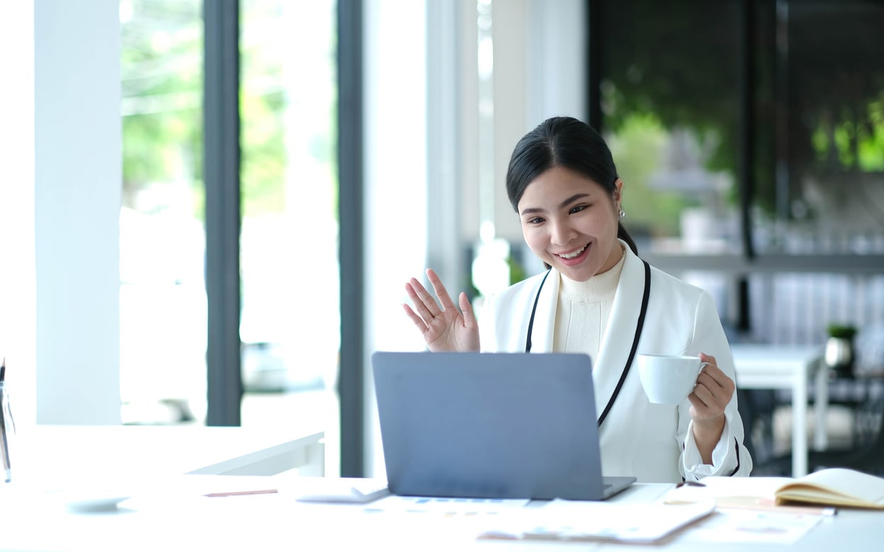 Video presentations conference young Asian businesswoman present